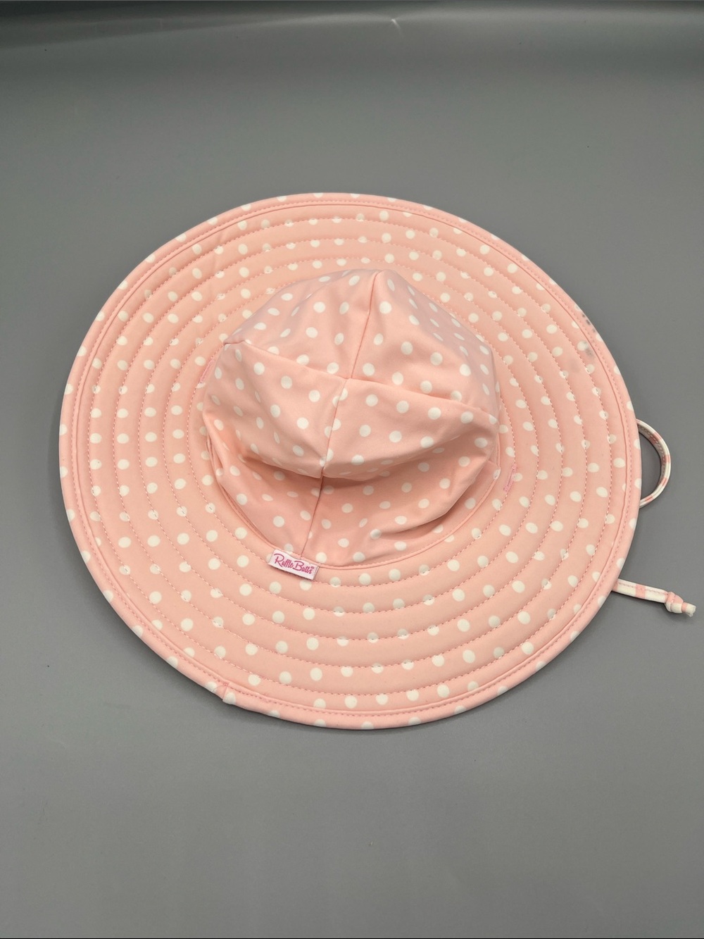RUFFLEBUTTS PINK POLKA DOT AND STRIPE SUNHAT size 0-12 months